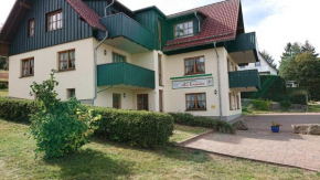 Гостиница Landhausferienwohnungen Am Brockenblick  Зорге